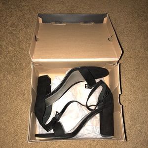 Brand new black heels.